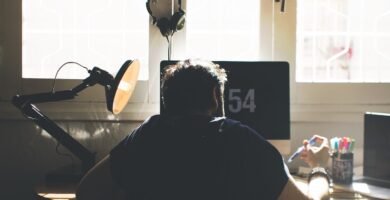man, chair, computer, desk, sit, seated, electronics, indoors, lamp, laptop, room, workspace, home office, work from home, computer, desk, laptop, room, home office, home office, home office, home office, home office